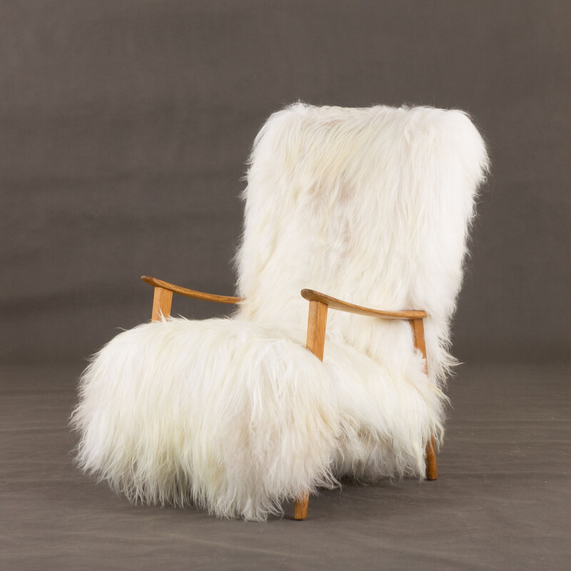 Vintage lounge armchair with high back in very long fur sheepskin, Denmark 1960