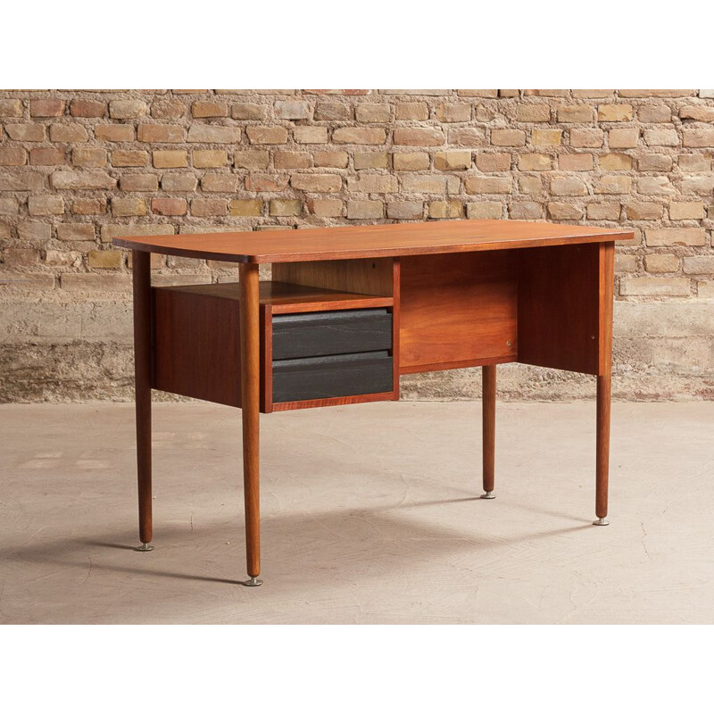 Vintage teak desk with elegant light lines renovated with touches of black 1960s