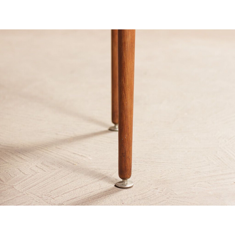 Vintage teak desk with elegant light lines renovated with touches of black 1960s