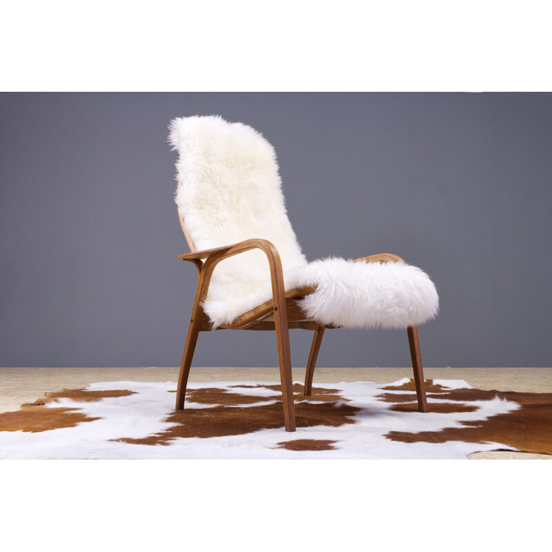 Vintage Yngve Ekstrom Lamino High back lounge chair in oak and sheepskin, Swedese 1951s