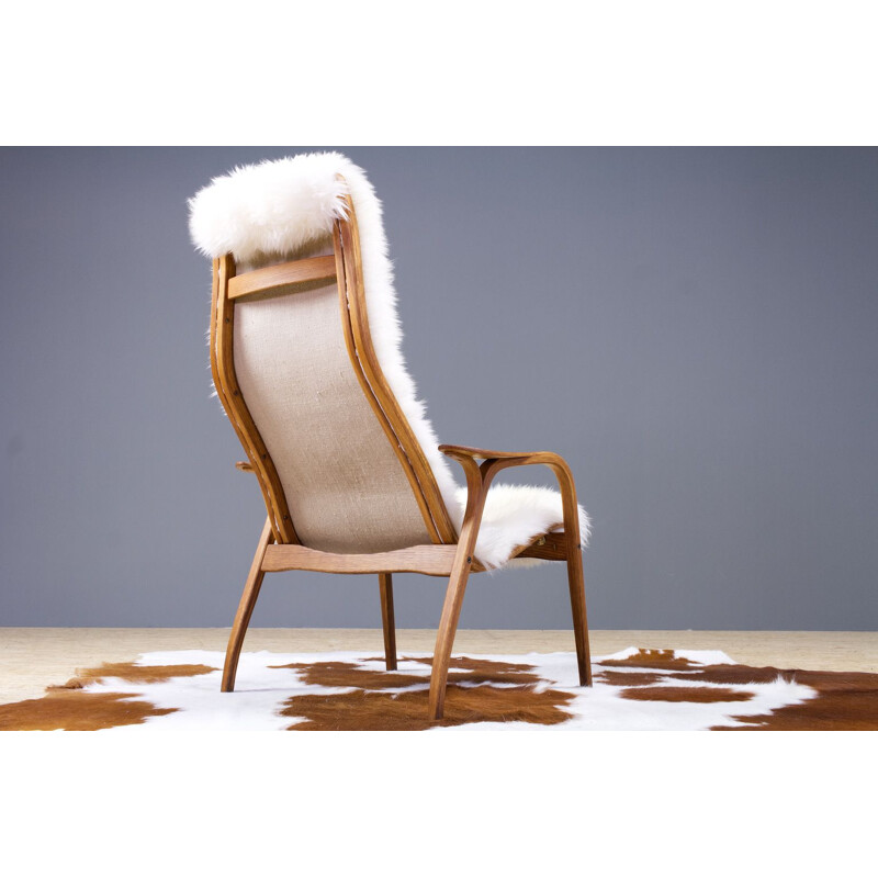 Vintage Yngve Ekstrom Lamino High back lounge chair in oak and sheepskin, Swedese 1951s