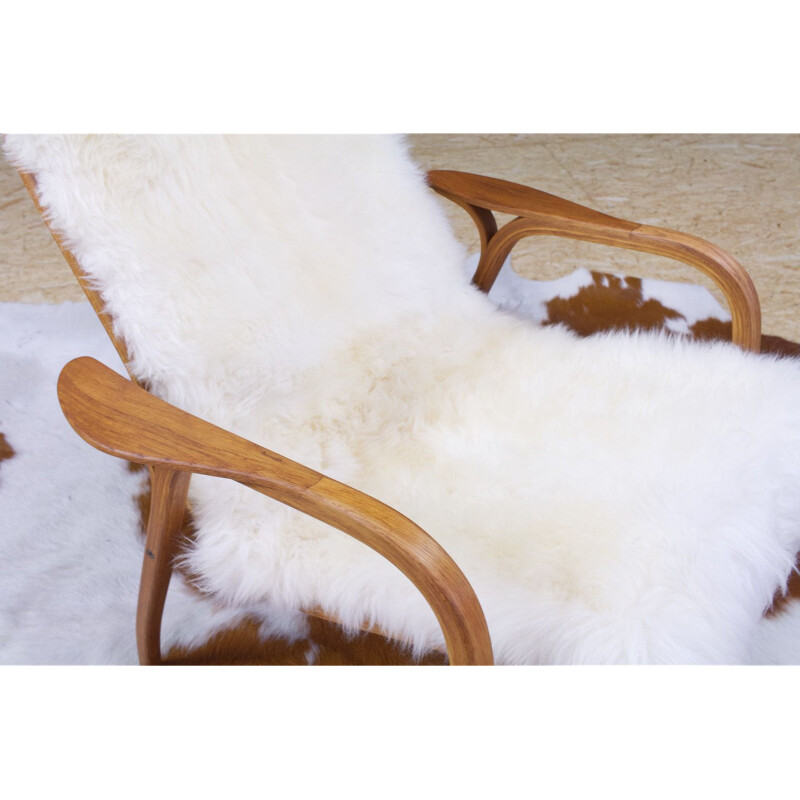 Vintage Yngve Ekstrom Lamino High back lounge chair in oak and sheepskin, Swedese 1951s