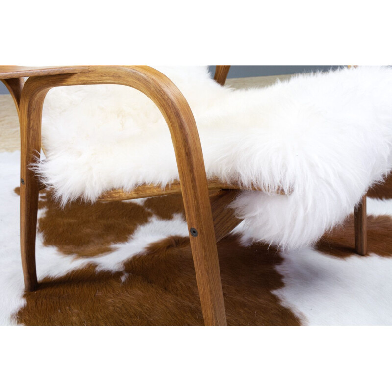 Vintage Yngve Ekstrom Lamino High back lounge chair in oak and sheepskin, Swedese 1951s