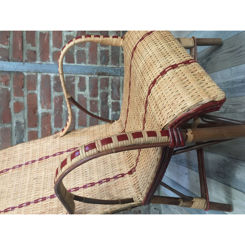 Vintage woven rattan armchair with red border 1950s