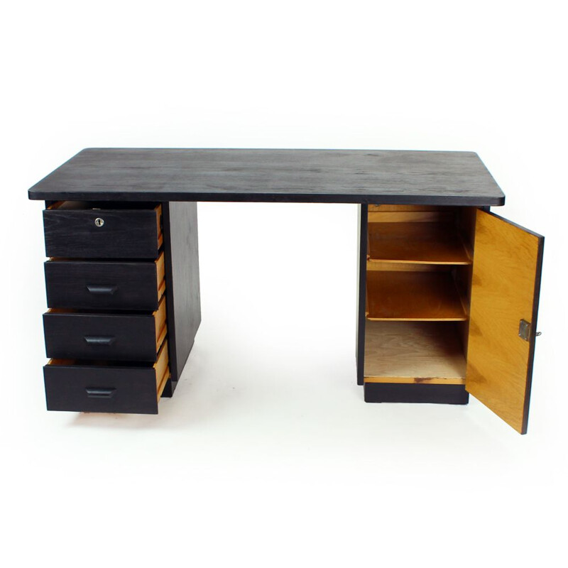 Large functionalist vintage desk in black oak from Jitona, Czechoslovakia 1940