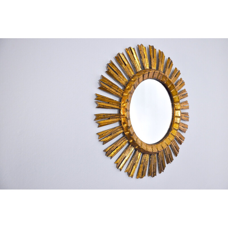 Vintage sunburst mirror in gilded wood