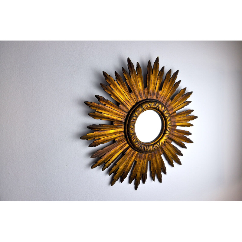 Vintage sunburst mirror in gilded wood