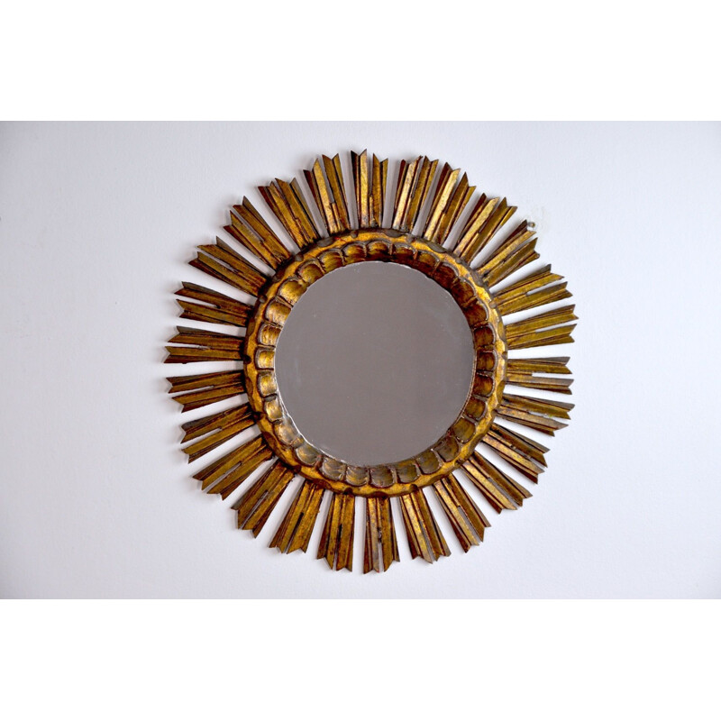 Vintage sunburst mirror in golden wood 1950