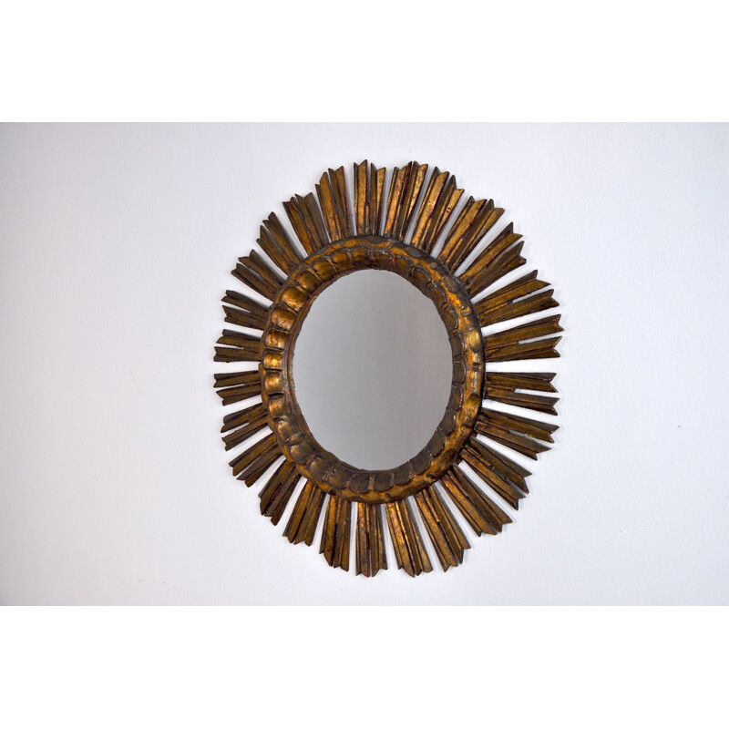 Vintage sunburst mirror in golden wood 1950