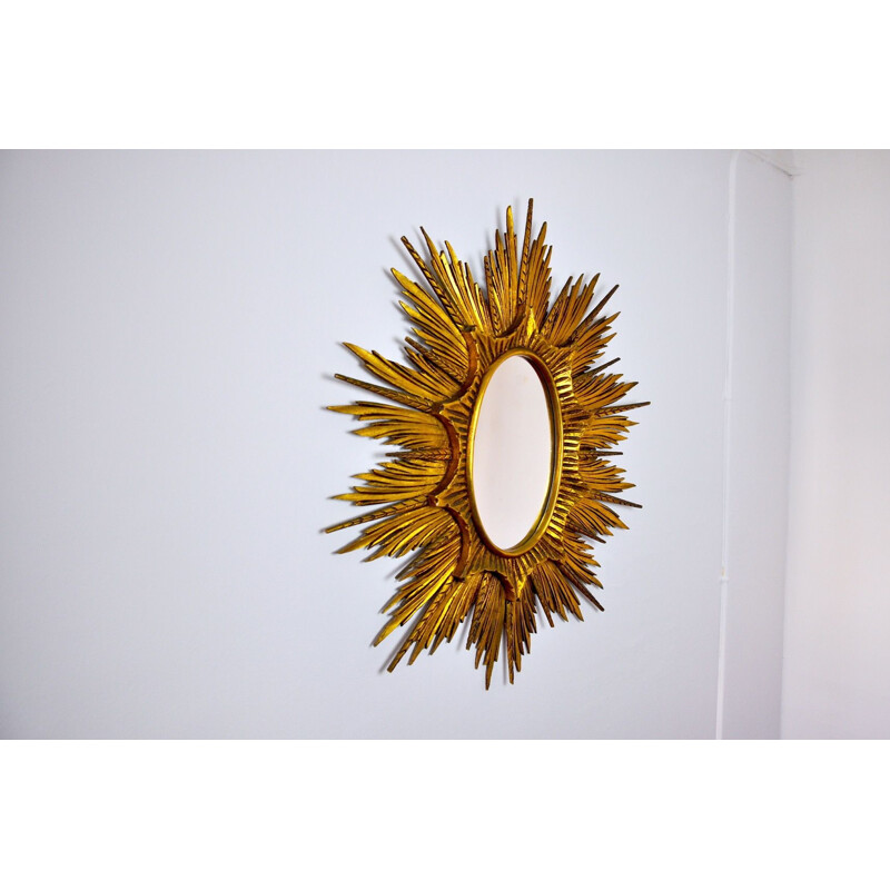Specchio d'epoca con raggi di sole in legno dorato