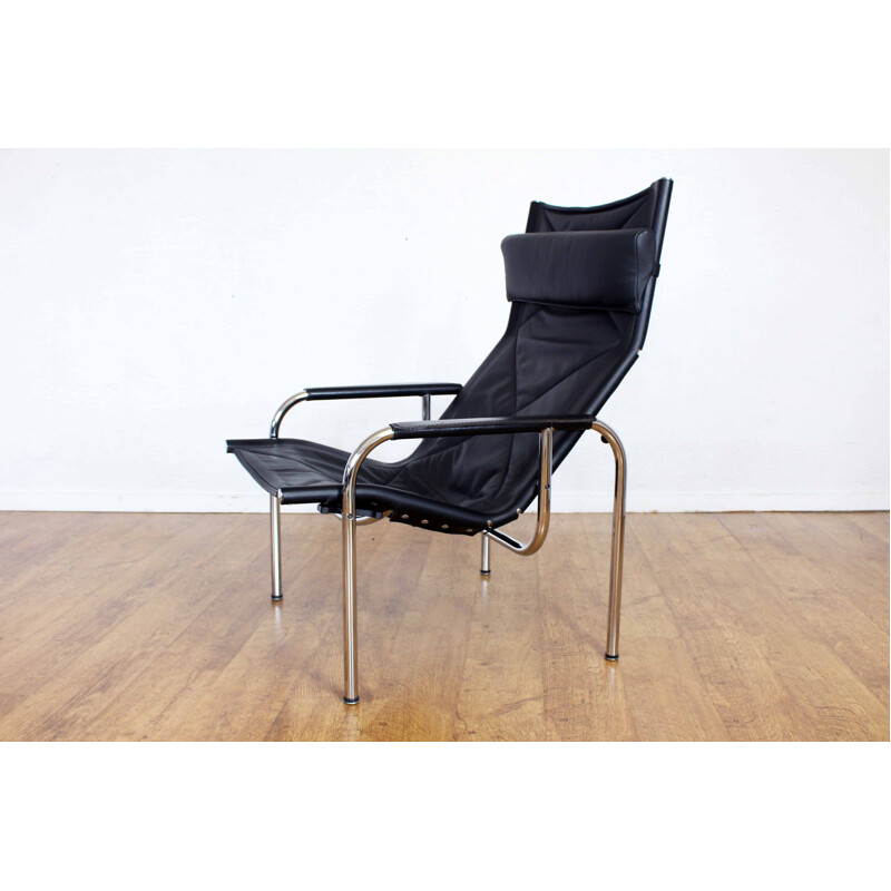 Vintage leather armchair with ottoman by Hans Eichenberger model HE1106, Switzerland 1960s