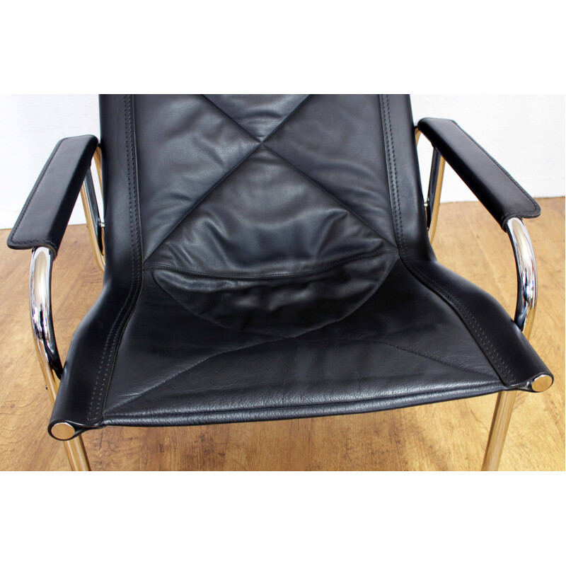 Vintage leather armchair with ottoman by Hans Eichenberger model HE1106, Switzerland 1960s