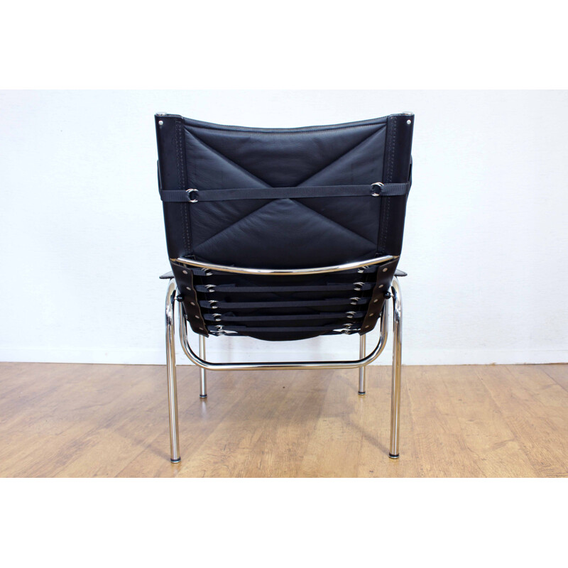 Vintage leather armchair with ottoman by Hans Eichenberger model HE1106, Switzerland 1960s