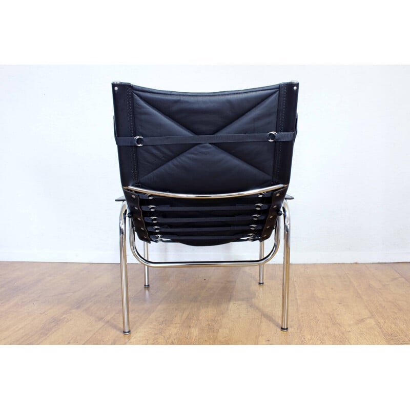 Vintage leather armchair with ottoman by Hans Eichenberger model HE1106, Switzerland 1960s