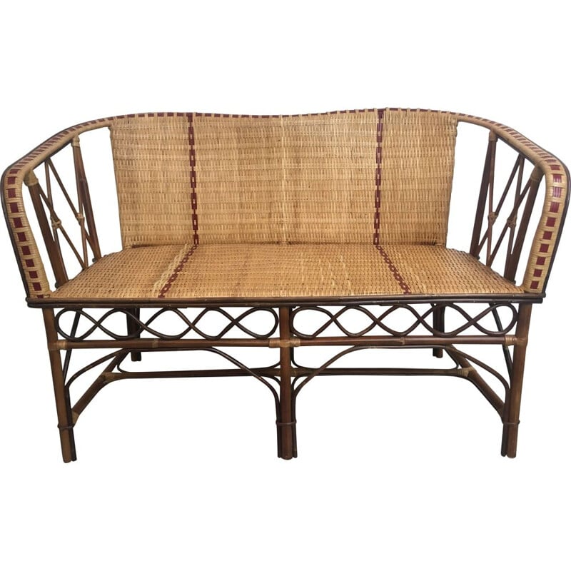 Vintage woven rattan sofa with red edging