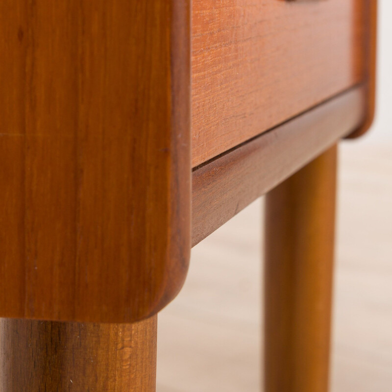 Pair of vintage teak nightstands with 2 drawers with sculptular handles, Norway 1960s