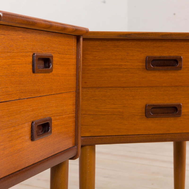 Pair of vintage teak nightstands with 2 drawers with sculptular handles, Norway 1960s