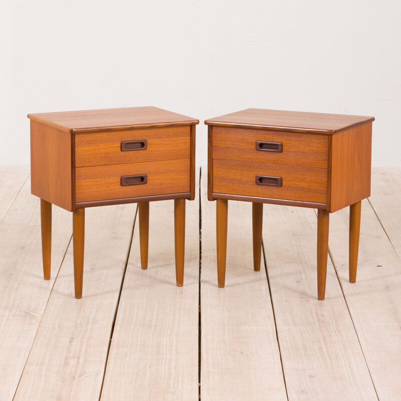 Pair of vintage teak nightstands with 2 drawers with sculptular handles, Norway 1960s