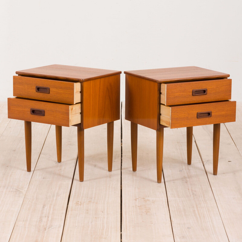 Pair of vintage teak nightstands with 2 drawers with sculptular handles, Norway 1960s