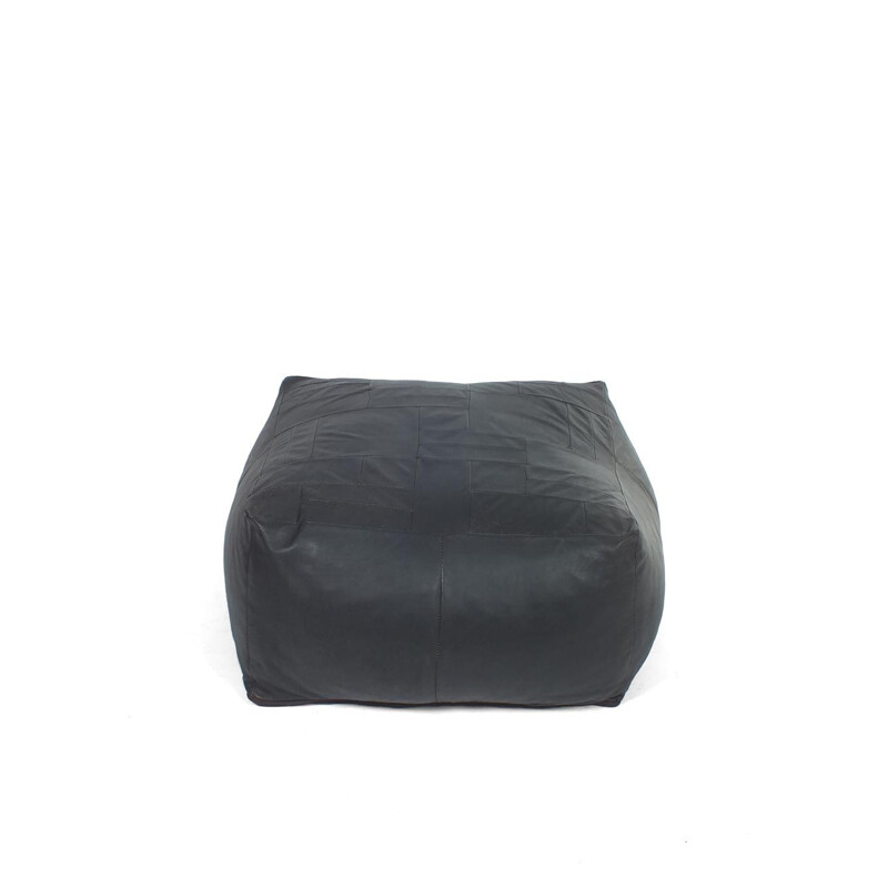 Large vintage leather pouffe or ottoman by De Sede