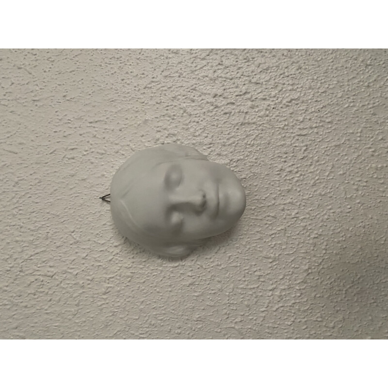 Vintage woman's face in porcelain Unknown from the Seine 1930s