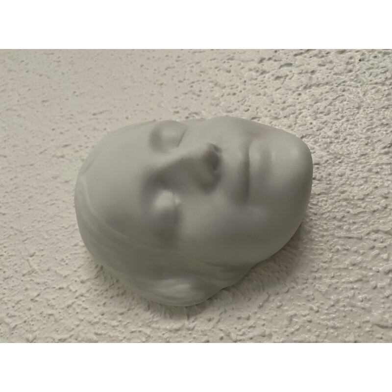 Vintage woman's face in porcelain Unknown from the Seine 1930s