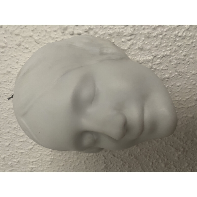 Vintage woman's face in porcelain Unknown from the Seine 1930s