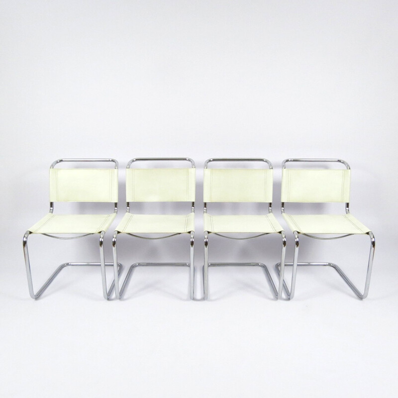 Set of 4 vintage chromed metal and skai chairs 1980s