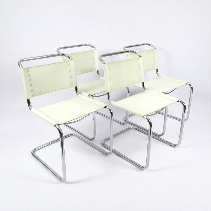 Set of 4 vintage chromed metal and skai chairs 1980s