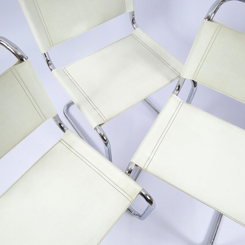 Set of 4 vintage chromed metal and skai chairs 1980s