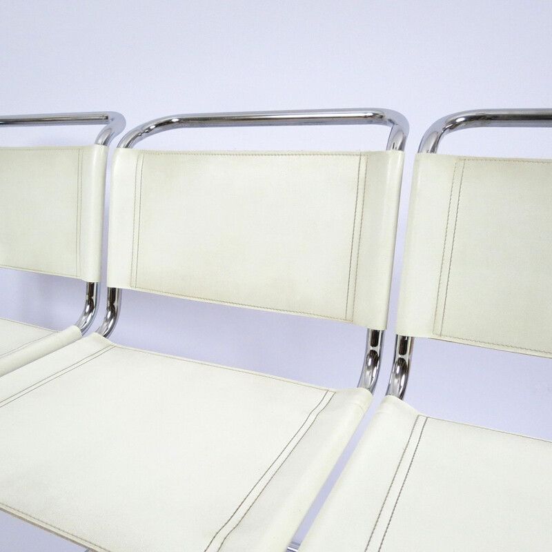 Set of 4 vintage chromed metal and skai chairs 1980s