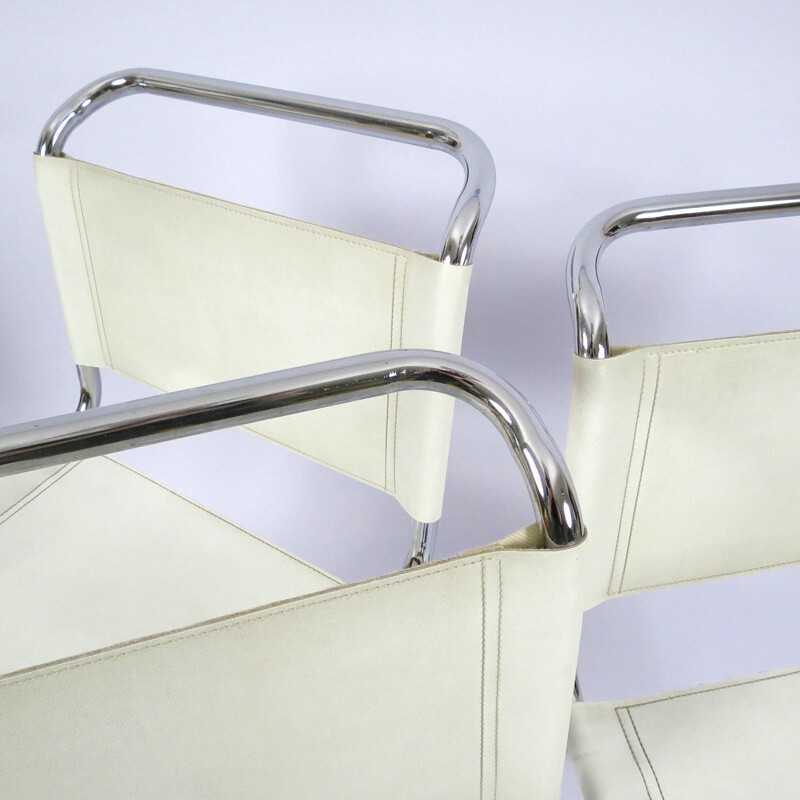 Set of 4 vintage chromed metal and skai chairs 1980s