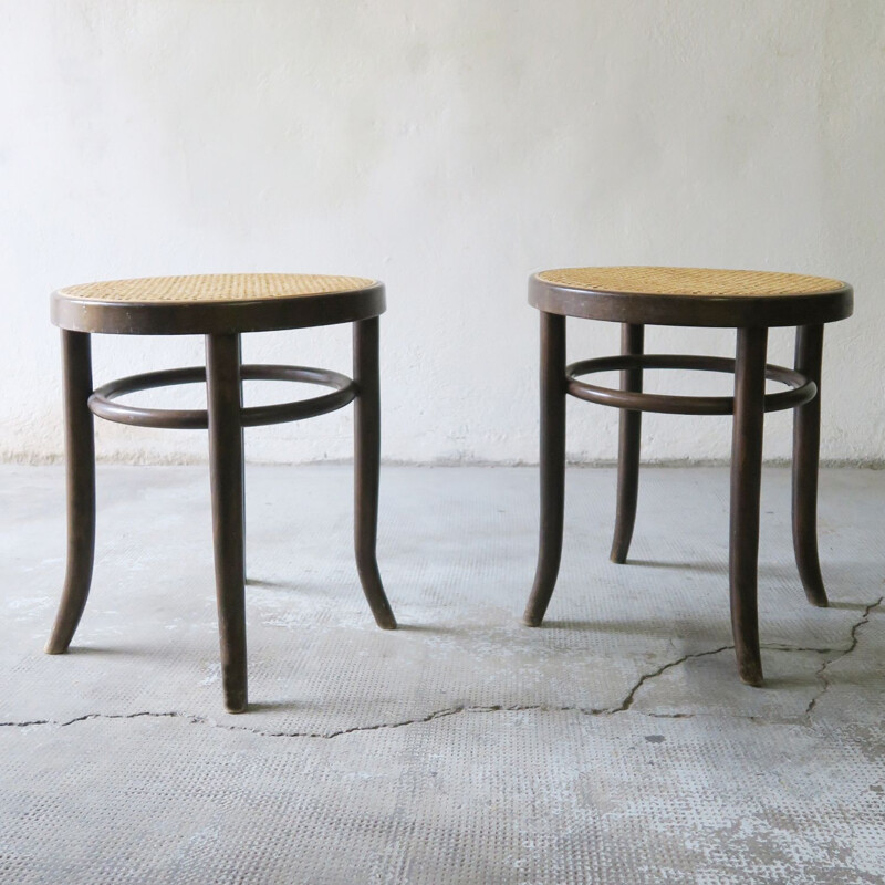 Pair of caned vintage stools