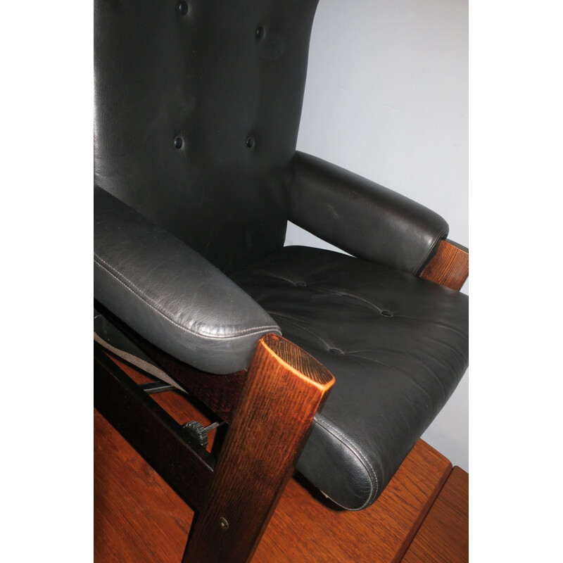 Vintage black leather lounge armchair, Danish 1960