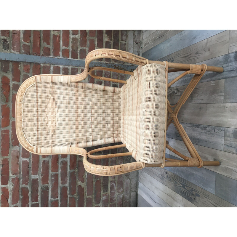 Vintage woven rattan armchair