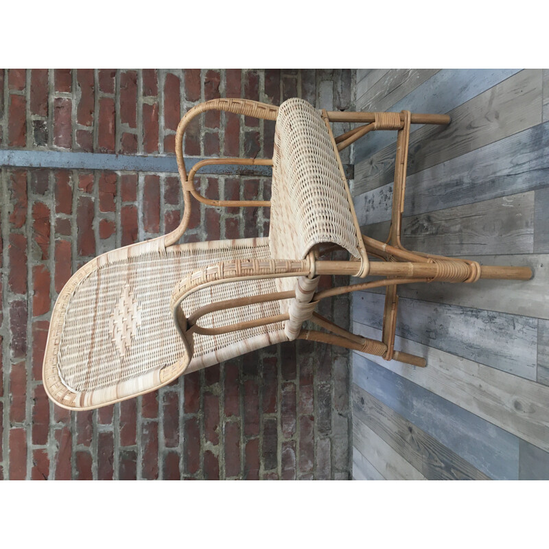 Vintage woven rattan armchair