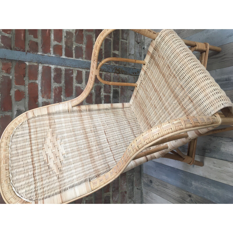 Vintage woven rattan armchair