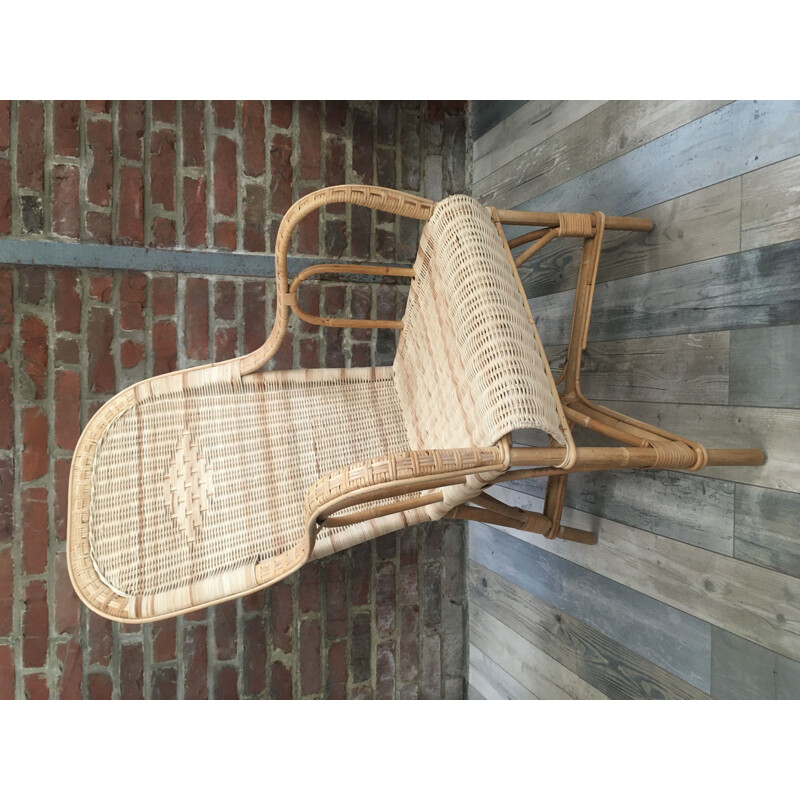 Vintage woven rattan armchair