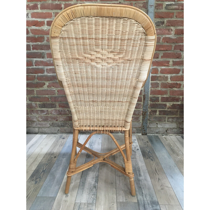 Vintage woven rattan armchair