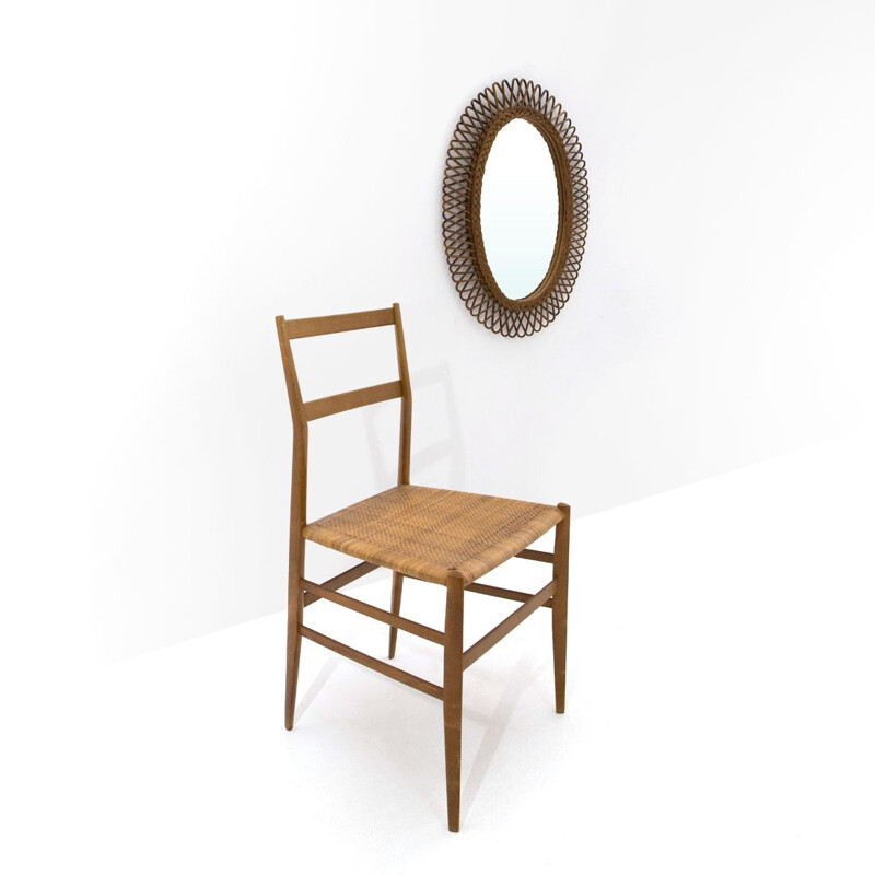 Vintage Oval mirror with woven rattan frame 1950s