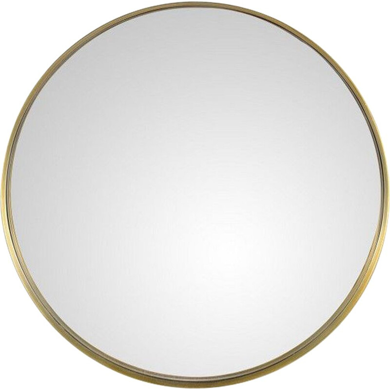 Miroir vintage rond sur contour laiton