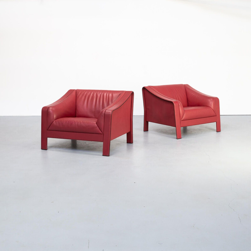 Pair of red vintage leather armchairs, Italy 1980s