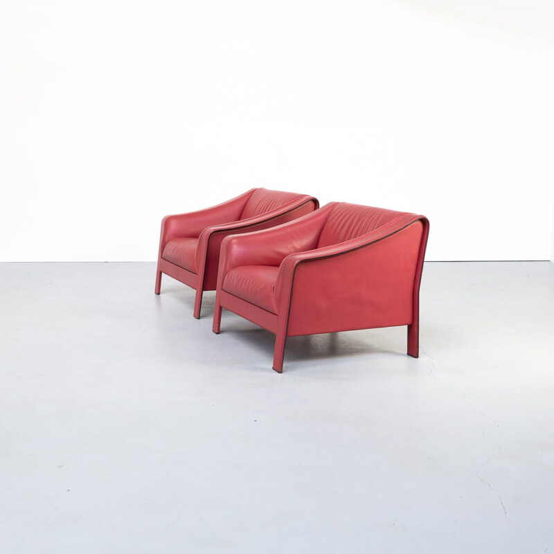 Pair of red vintage leather armchairs, Italy 1980s