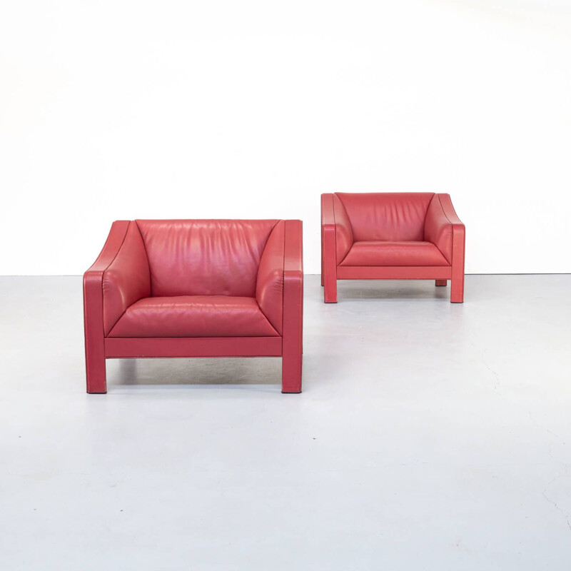 Pair of red vintage leather armchairs, Italy 1980s