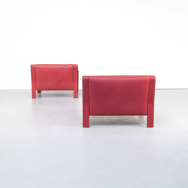 Pair of red vintage leather armchairs, Italy 1980s