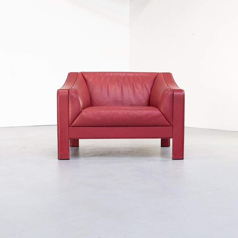 Pair of red vintage leather armchairs, Italy 1980s