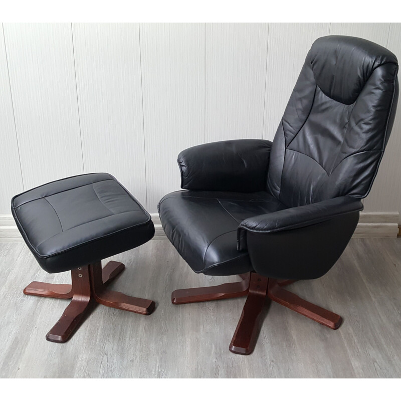 Vintage Leather armchair with footrest by H. Knudsen