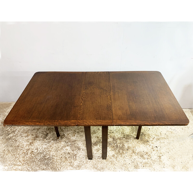 Vintage era vintage solid oak gate fold drop leaf table