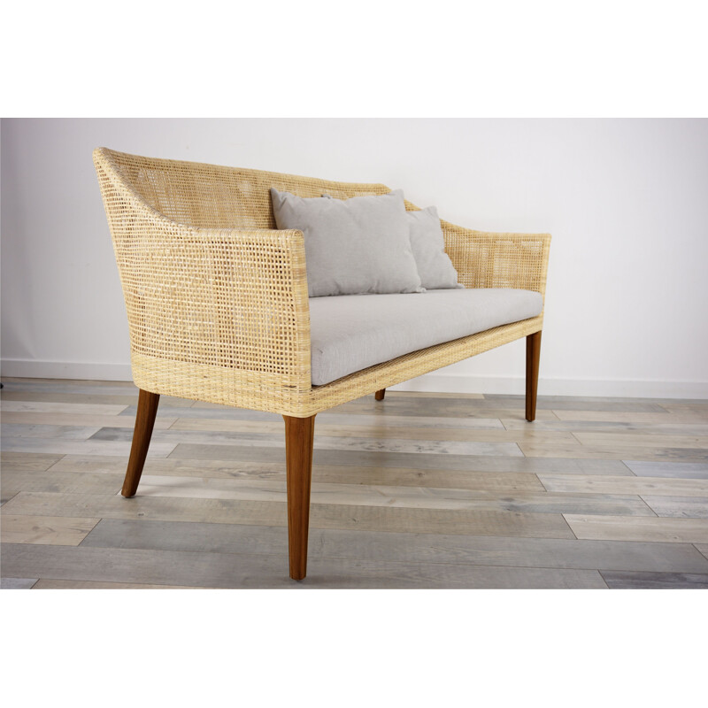 Vintage wooden and rattan sofa