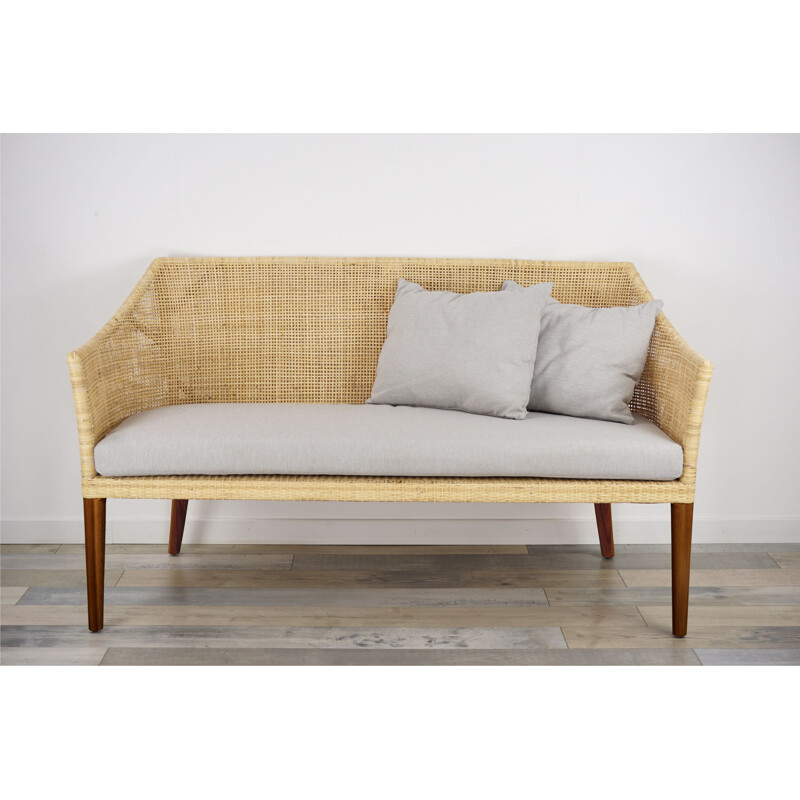 Vintage wooden and rattan sofa